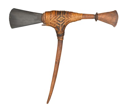 Lot 115 - A MELANESIAN STONE AXE