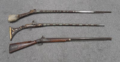 Lot 68 - A 22 BORE ARAB SILVER-MOUNTED MATCHLOCK MUSKET