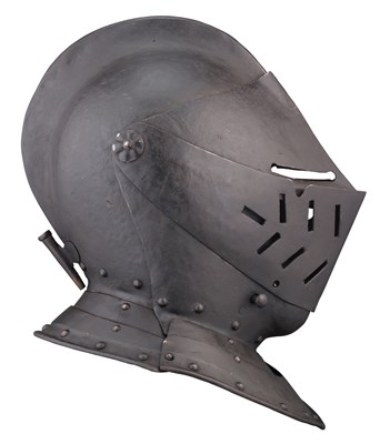 Lot 222 - A CLOSE HELMET IN THE EARLY 17TH CENTURY GERMAN STYLE