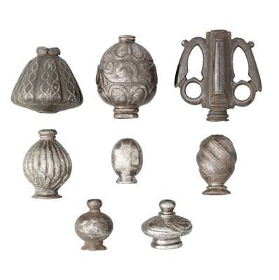 Lot 371 - A GROUP OF EIGHT IRON SWORD POMMELS