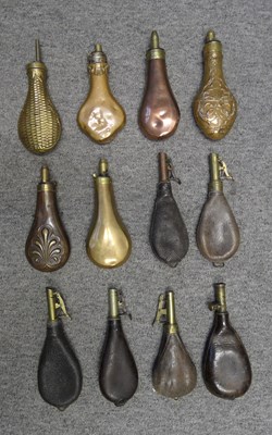 Lot 400 - A GROUP OF ELEVEN POWDER AND SHOT-FLASKS FOR SPORTING GUNS