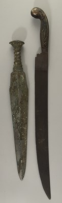 Lot 130 - A CARVED JADE SWORD HILT AND BLADE FRAGMENT IN CHINESE WARRING STATES STYLE; SIX BRONZE SWORDS (JIAN) IN CHINESE ZHOU DYNASTY OR EARLY WARRING STATES (1050-221 BC) STYLE, 20TH CENTURY