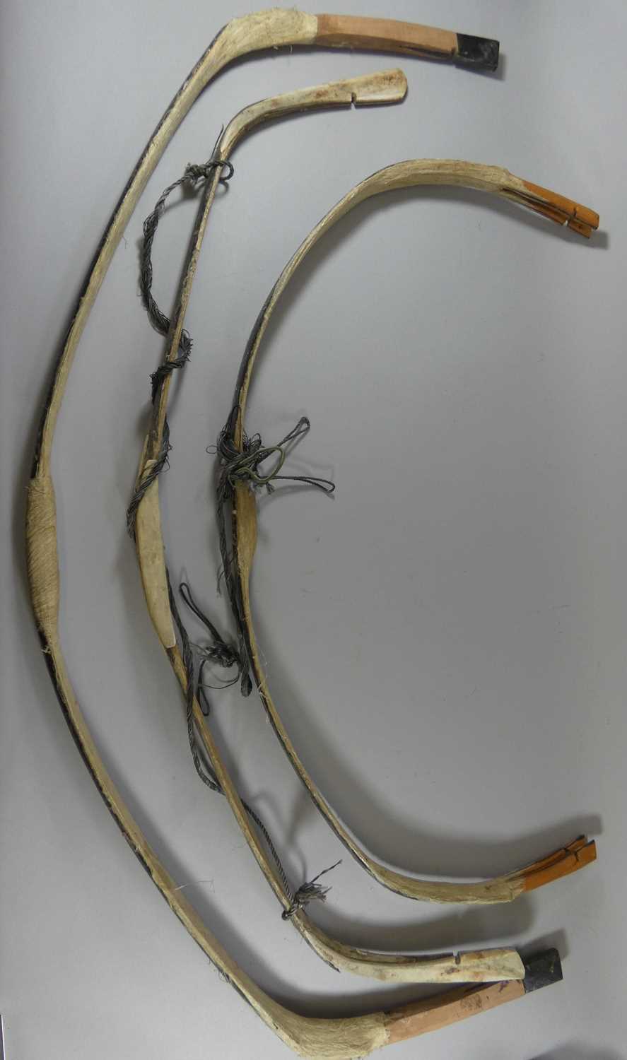 Lot 21 - NINE ASIAN STYLE BOWS AND A TARGET BOW BY EDWARD MCEWEN