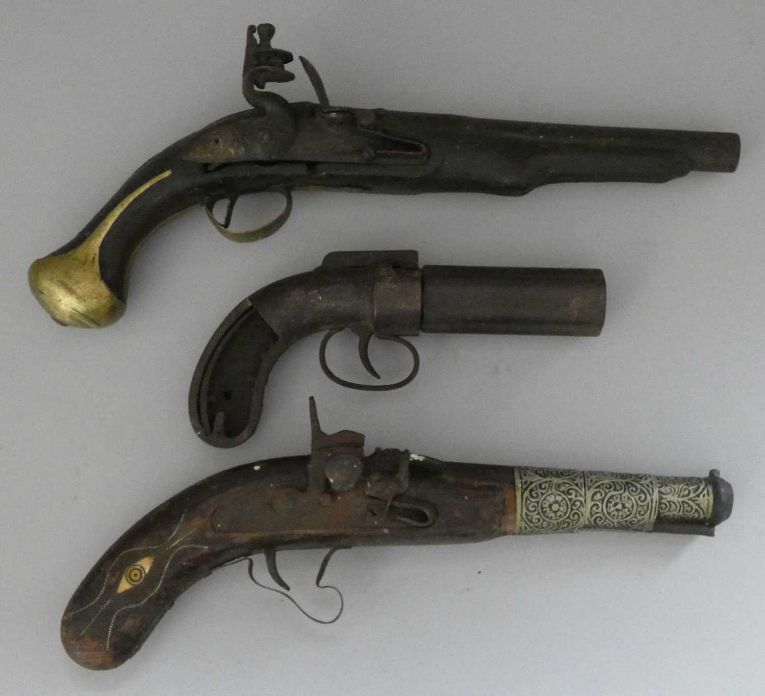 Lot 451 - A COMPOSITE FLINTLOCK PISTOL; PARTS OF A PERCUSSION PEPPERBOX REVOLVER, AND A SNAPHAUNCE PISTOL