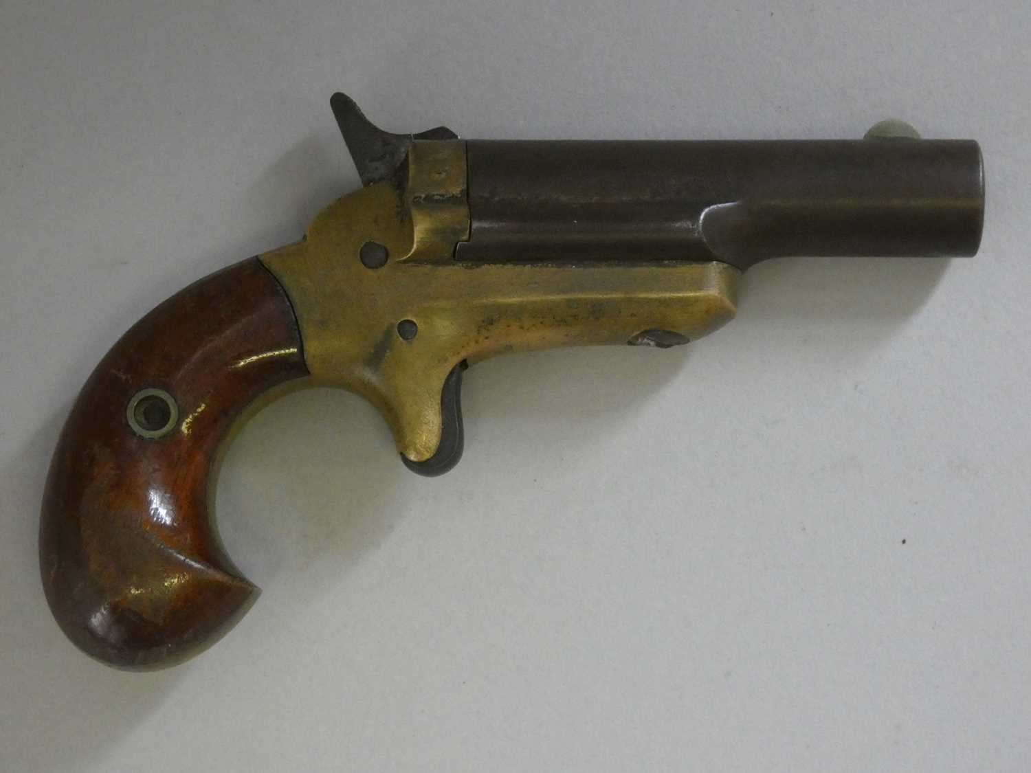Lot 498 - A .41 CALIBRE RIM-FIRE COLT THIRD MODEL DERRINGER, CIRCA 1875