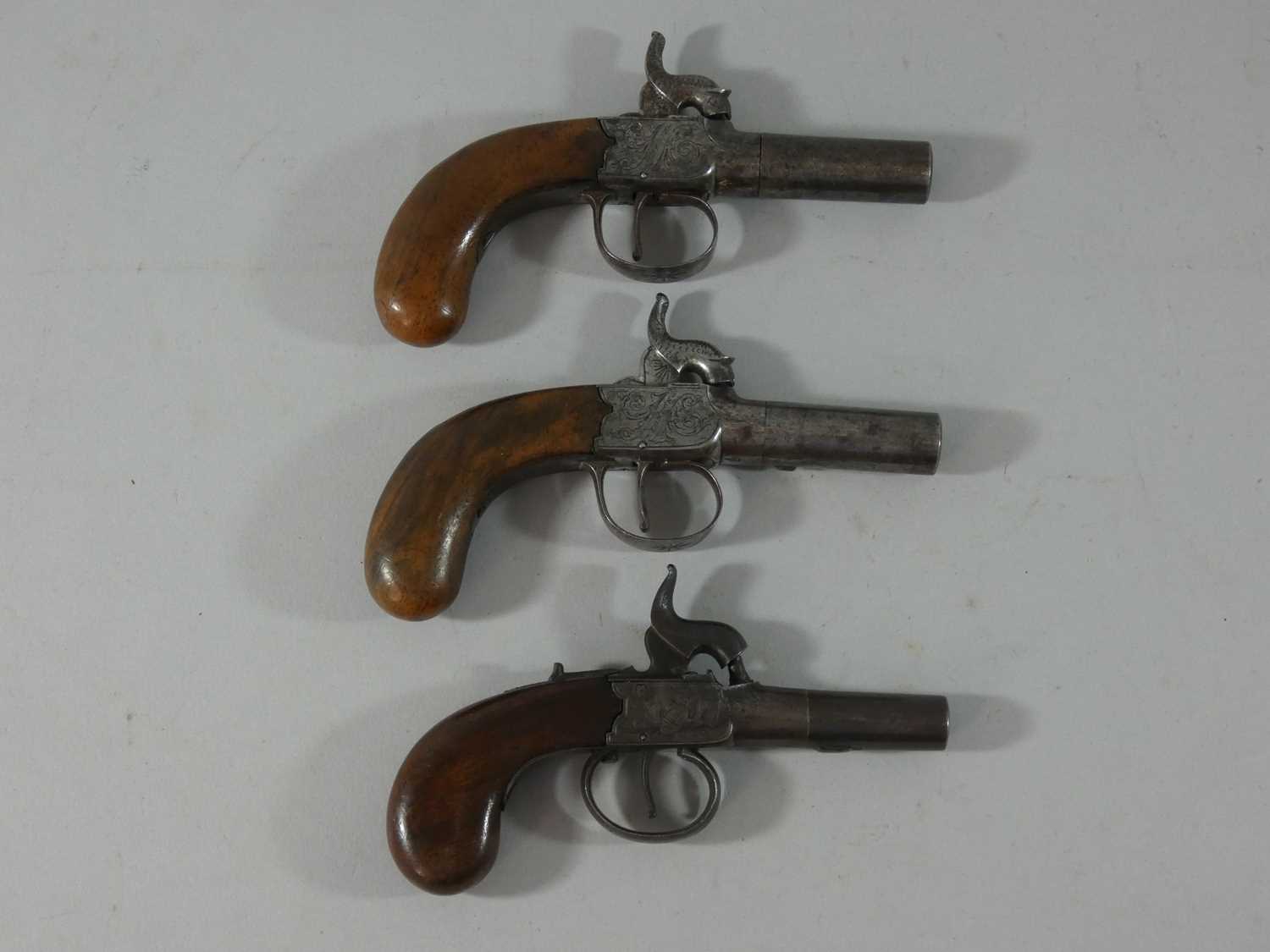 Lot 521 - A PAIR OF 42 BORE PERCUSSION POCKET PISTOLS ND A 60 BORE PERCUSSION POCKET PISTOL