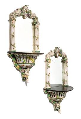 Lot 12 - A PAIR OF GERMAN PORCELAIN MIRRORED WALL SCONCES