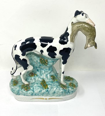 Lot 27 - A STAFFORDSHIRE POTTERY FIGURE OF A WHIPPET (OR GREYHOUND)