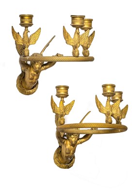 Lot 87 - A PAIR OF FRENCH EMPIRE THREE-LIGHT ORMOLU WALL SCONCES