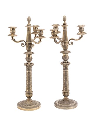 Lot 92 - A PAIR OF SILVERED THREE-LIGHT CANDELABRA