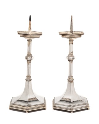 Lot 173 - A PAIR OF GEORGE V ARTS AND CRAFTS SILVER PRICKET CANDLESTICKS