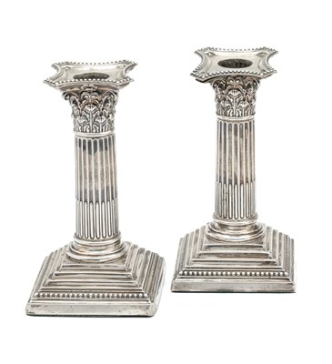 Lot 199 - A PAIR OF EDWARDIAN SILVER DESK CANDLESTICKS