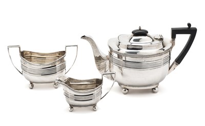 Lot 200 - A SILVER MATCHING THREE-PIECE TEA SET