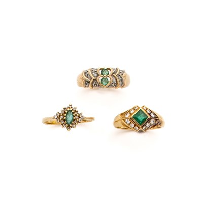 Lot 311 - THREE EMERALD AND DIAMOND RINGS