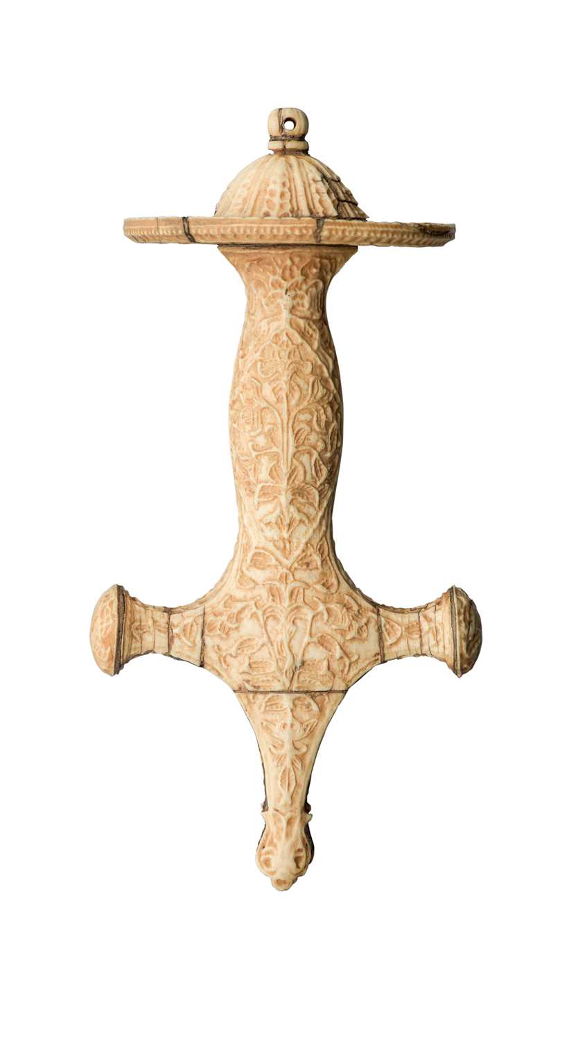 Lot 233 - Ëœâ“Œ A RARE DETACHED INDIAN CARVED IVORY HILT FOR A TALWAR, 19TH CENTURY