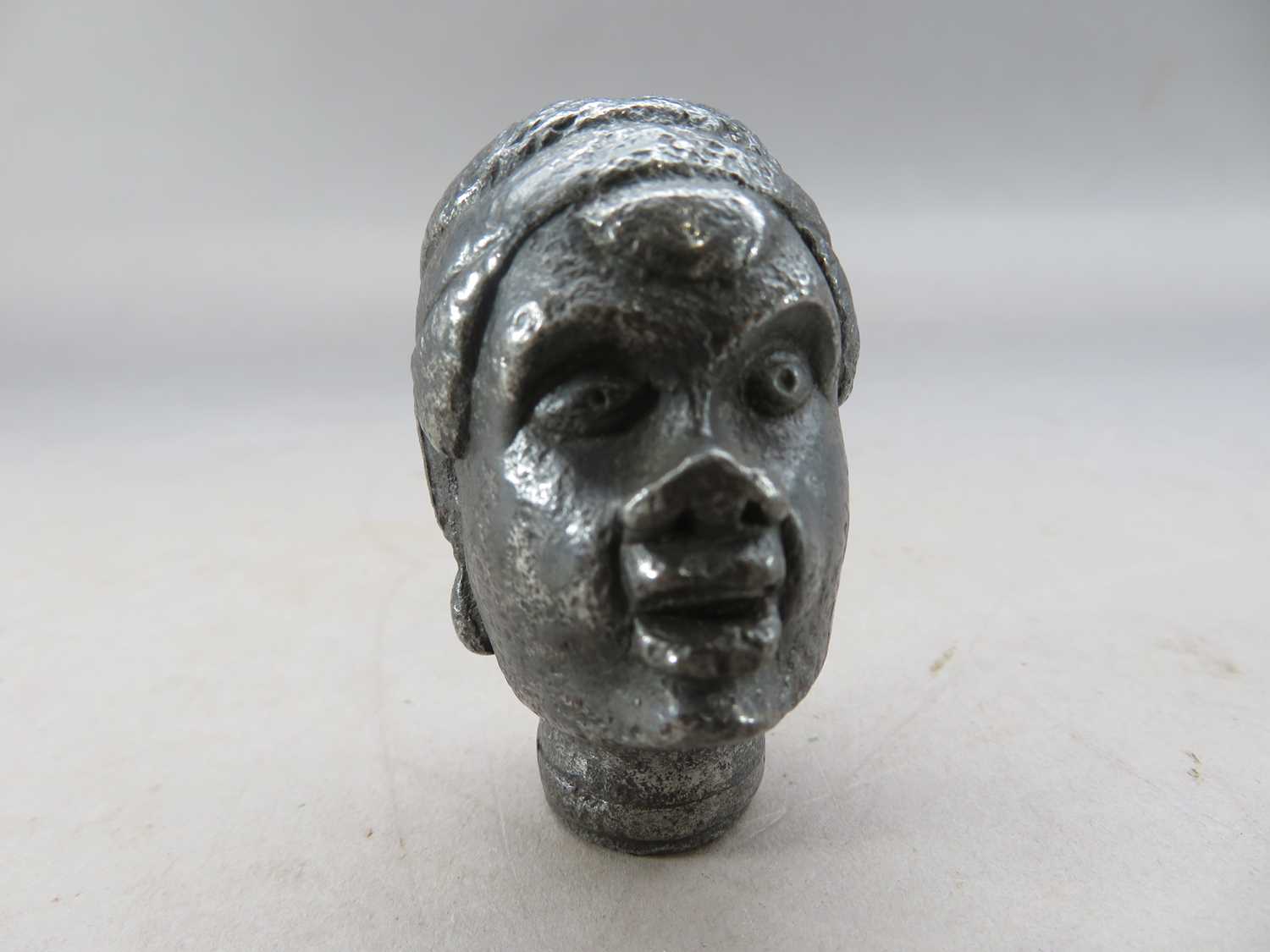 Lot 292 - â“Œ A DETACHED POMMEL FROM A RAPIER, EARLY 17TH CENTURY