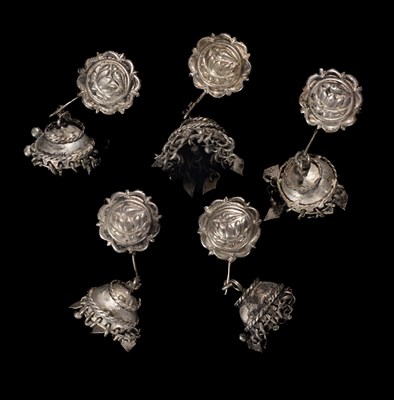 Lot 287 - FIVE SILVER ALLOY EAR ORNAMENTS, INDONESIA, 19TH CENTURY