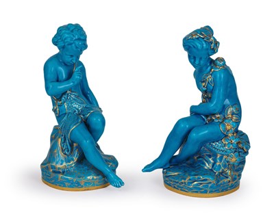 Lot 18 - A PAIR OF SÃˆVRES STYLE TURQUOISE GLAZED FIGURES OF CUPID AND PSYCHE