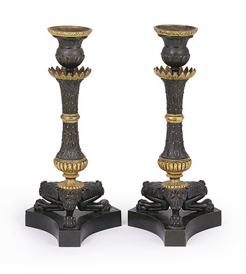 Lot 80 - A PAIR OF FRENCH PARCEL-GILT-BRONZE CANDLESTICKS