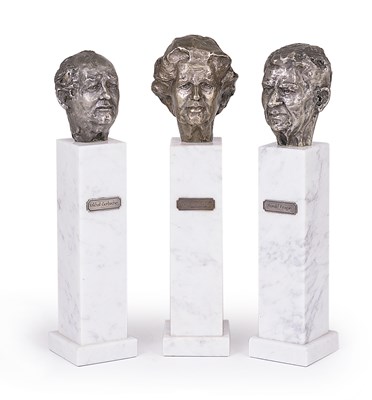 Lot 90 - A SUITE OF THREE PATINATED SILVER PORTRAIT BUSTS OF RONALD REAGAN