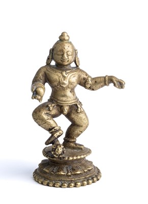 Lot 586 - A BRONZE FIGURE OF DANCING KRISHNA, ORISSA, EASTERN INDIA, CIRCA 18TH CENTURY