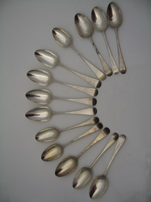 Lot 101 - A COLLECTION OF THIRTEEN GEORGIAN SILVER TABLESPOONS