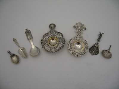 Lot 140 - TWO GERMAN SILVER TEA STRAINERS