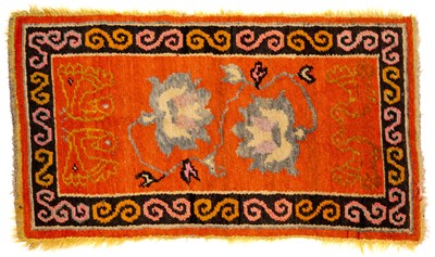 Lot 545 - A TIBETAN RUG, 20TH CENTURY