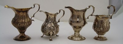 Lot 203 - FOUR GEORGE III SILVER MILK JUGS