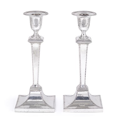 Lot 224 - A PAIR OF GEORGE V SILVER CANDLESTICKS