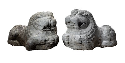 Lot 549 - A PAIR OF CARVED GRANITE LIONS, TAMIL NADU, SOUTH INDIA, CIRCA 12TH CENTURY