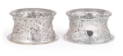 Lot 379 - A PAIR OF EDWARDIAN SILVER DISH RINGS