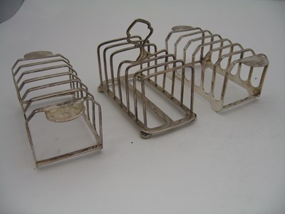 Lot 383 - A PAIR OF SILVER TOAST RACKS