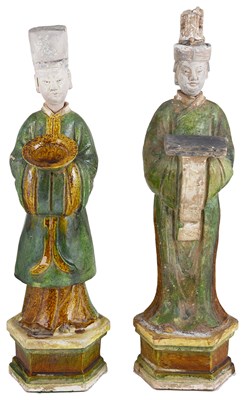 Lot 4 - A PAIR OF CHINESE SANCAI GLAZED POTTERY FIGURES OF ATTENDANTS