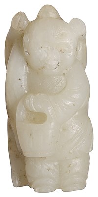 Lot 33 - A CHINESE GREYISH-WHITE JADE CARVING OF A BOY