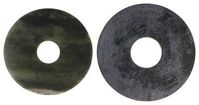 Lot 50 - TWO CHINESE ARCHAISTIC JADE BI DISCS