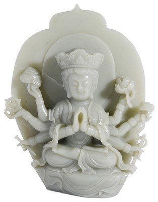 Lot 53 - A CHINESE CELADON JADE FIGURE OF GUANYIN