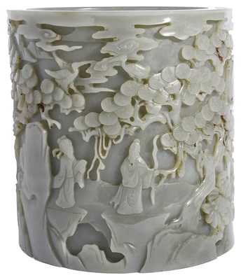 Lot 57 - A CHINESE CELADON JADE 'IMMORTALS' BRUSHPOT