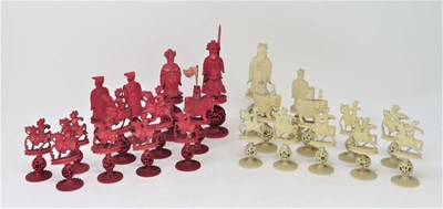 Lot 67 - ËœA CHINESE CARVED IVORY CHESS SET