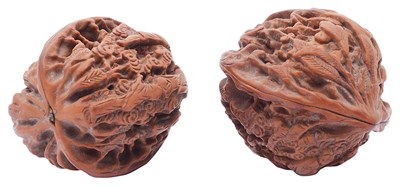 Lot 68 - A PAIR OF CHINESE CARVED WALNUTS