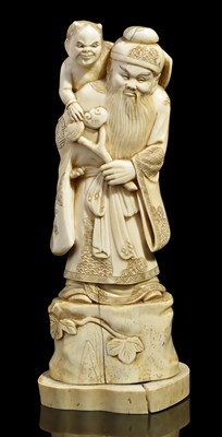 Lot 72 - ËœA JAPANESE WALRUS IVORY OKIMONO OF A CHINESE SCHOLAR WITH A DEMON