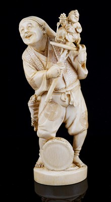 Lot 73 - A JAPANESE OKIMONO OF A PUPPETEER