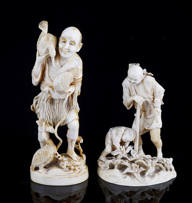 Lot 75 - ËœTWO JAPANESE IVORY OKIMONO