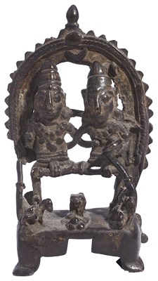 Lot 91 - A TRIBAL BRONZE FIGURE OF SIVA AND PARVATI