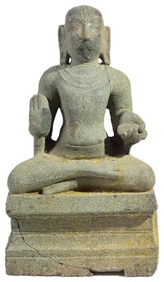 Lot 125 - A GRANITE SEATED FIGURE OF AN ALVAR