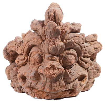 Lot 127 - A JAVANESE TERRACOTTA CORNER ANTEFIX