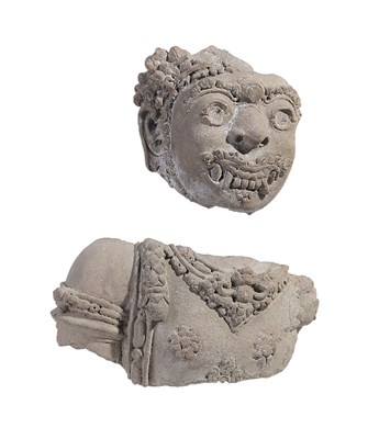 Lot 128 - A MAJAPAHIT FRAGMENTARY TERRACOTTA FIGURE OF A DVARAPALA