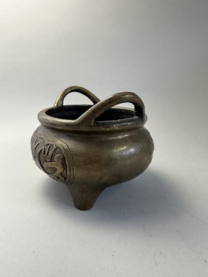 Lot 30 - A CHINESE BRONZE TRIPOD CENSER FOR THE ISLAMIC MARKET, QING DYNASTY, 18TH CENTURY