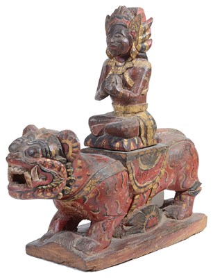 Lot 154 - A CARVED AND PAINTED WOOD FIGURE OF A MYTHICAL LION