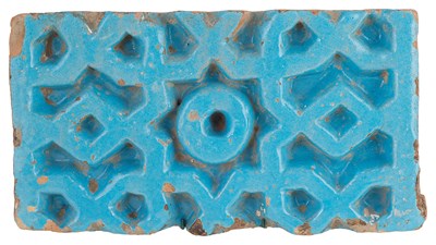 Lot 164 - â€¡ A TURQUOISE GLAZED RELIEF TILE